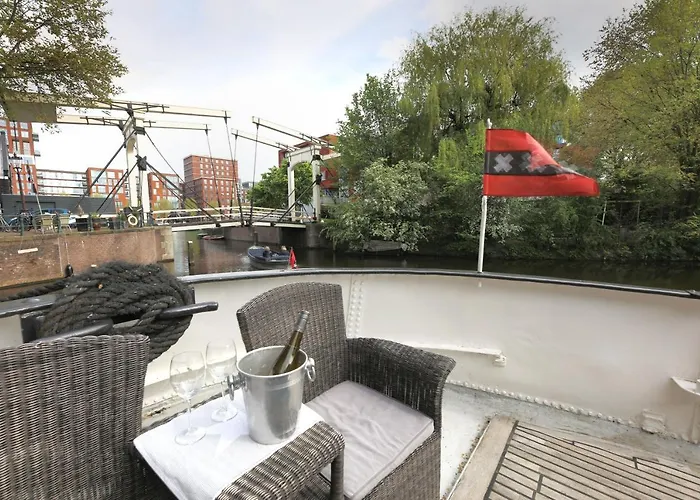 Houseboat Volle Maan Couette-café Amsterdam